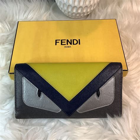 fendi monster eyes striped wallet|Fendi continental wallet on chain.